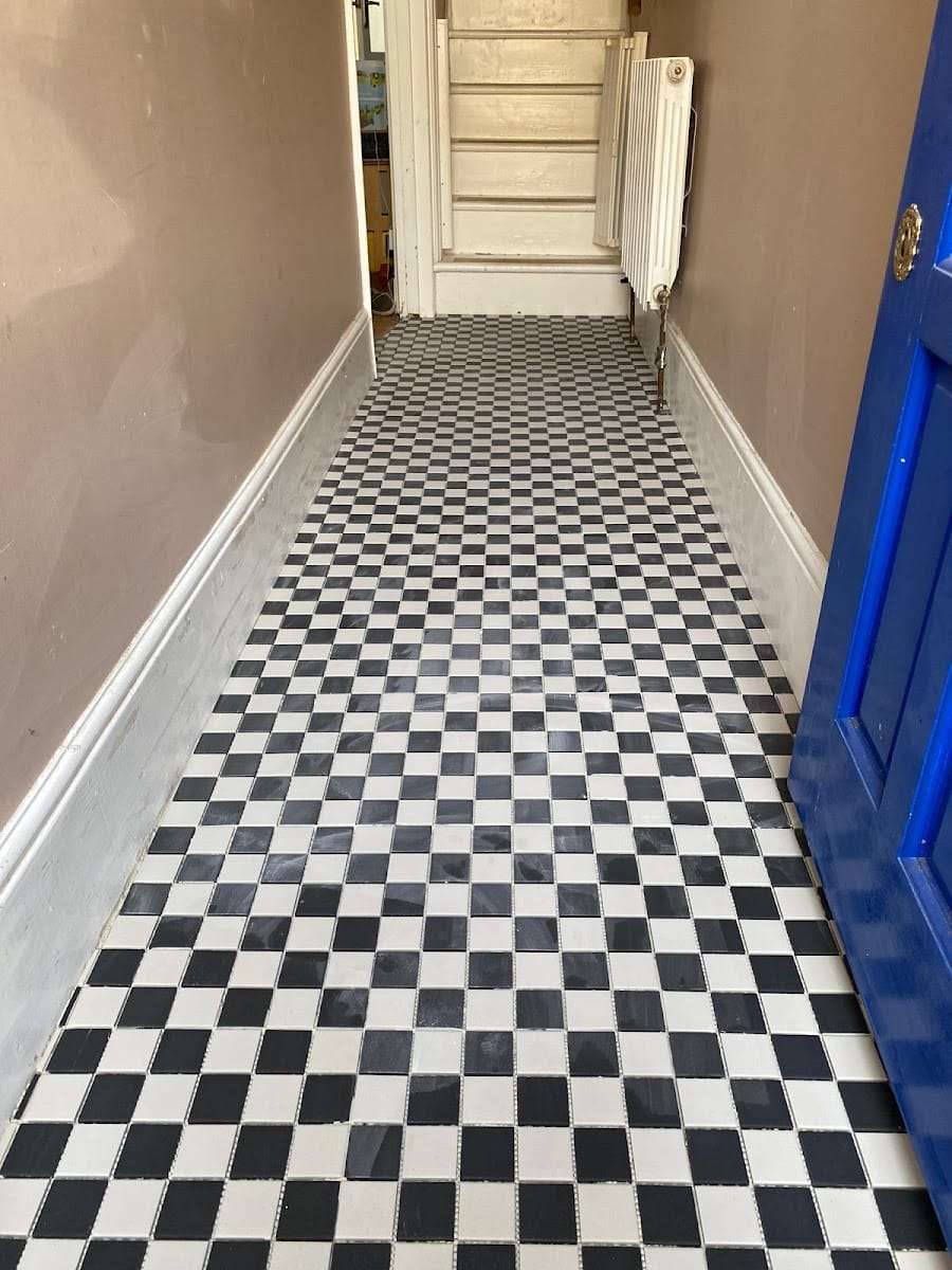 Chequerboard hallway floor, by Cutting Edge Tiling